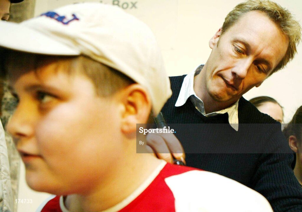 26 November 2003; Former Arsenal player Lee Dixon signs autographs for young fans following the first of its kind "Sporting Chance Seminar" hosted by St. John's Football Club in the Model Arts Centre, Sligo. Photo: James Connolly for SPORTSFILE