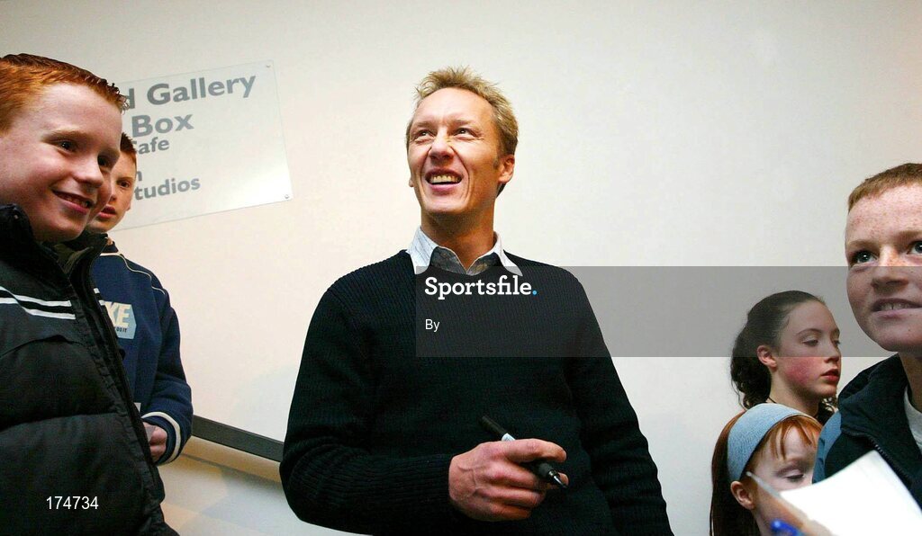 26 November 2003; Former Arsenal player Lee Dixon signs autographs for young fans following the first of its kind "Sporting Chance Seminar" hosted by St. John's Football Club in the Model Arts Centre, Sligo. Photo: James Connolly for SPORTSFILE