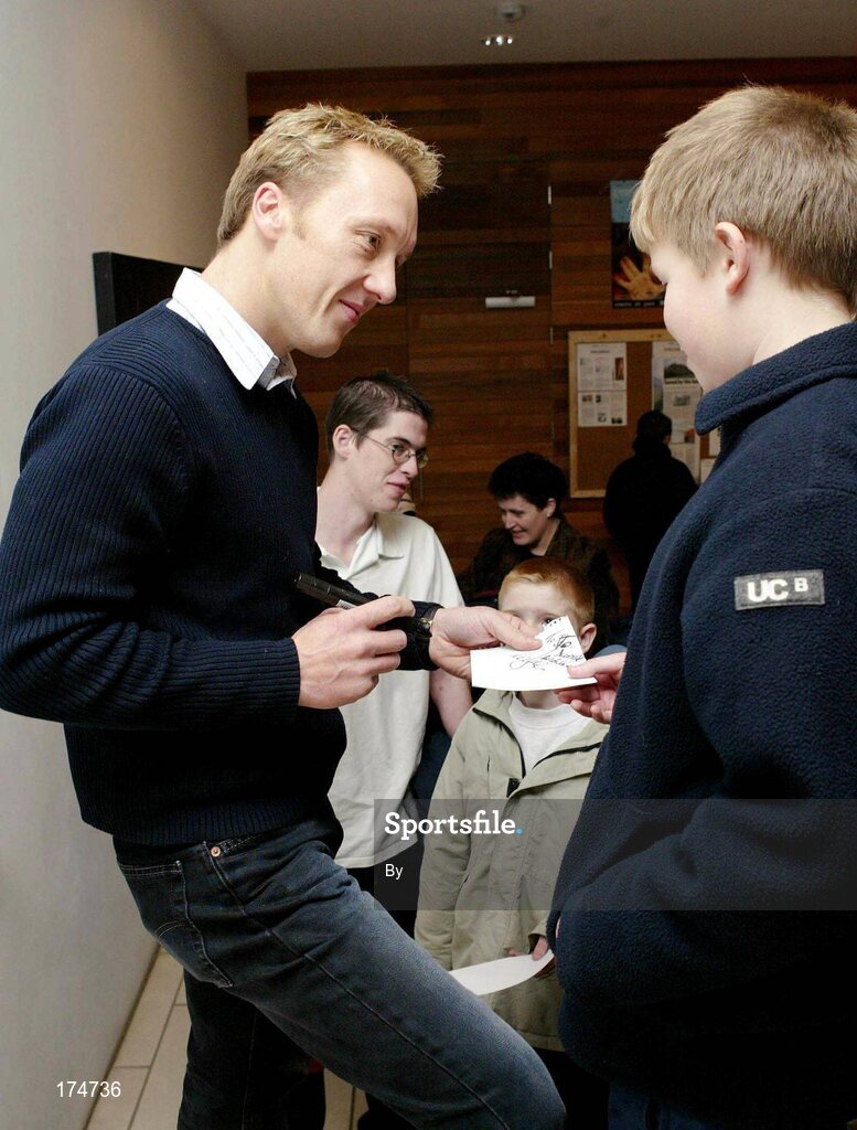 26 November 2003; Former Arsenal player Lee Dixon signs autographs for young fans following the first of its kind "Sporting Chance Seminar" hosted by St. John's Football Club in the Model Arts Centre, Sligo. Photo: James Connolly for SPORTSFILE