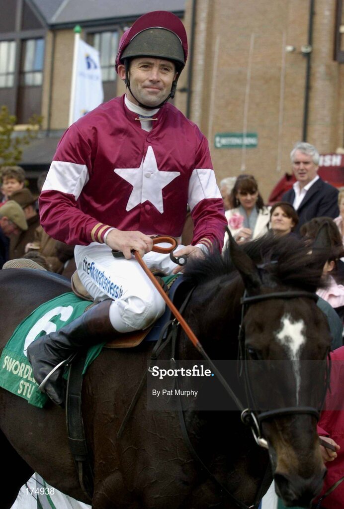 28 April 2005; Jockey Conor O'Dwyer enters the winners enclosure aboard War Of Attrition after they had won the Swordlestown Cup Novice Steeplechase. Punchestown Racecourse, Co. Kildare. Picture credit; Pat Murphy / SPORTSFILE