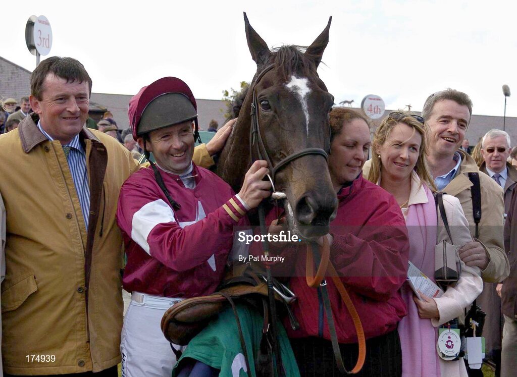 28 April 2005; Winning connections of War of Attrition including jockey Conor O'Dwyer and owner Michael O'Leary, right, after victory in the Swordlestown Cup Novice Steeplechase. Punchestown Racecourse, Co. Kildare. Picture credit; Pat Murphy / SPORTSFILE