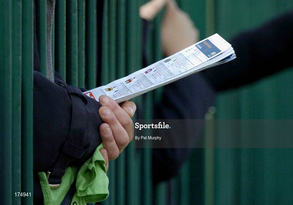 28 April 2005; A race fan checks his racecard during the Swordlestown Cup Novice Steeplechase. Punchestown Racecourse, Co. Kildare. Picture credit; Pat Murphy / SPORTSFILE