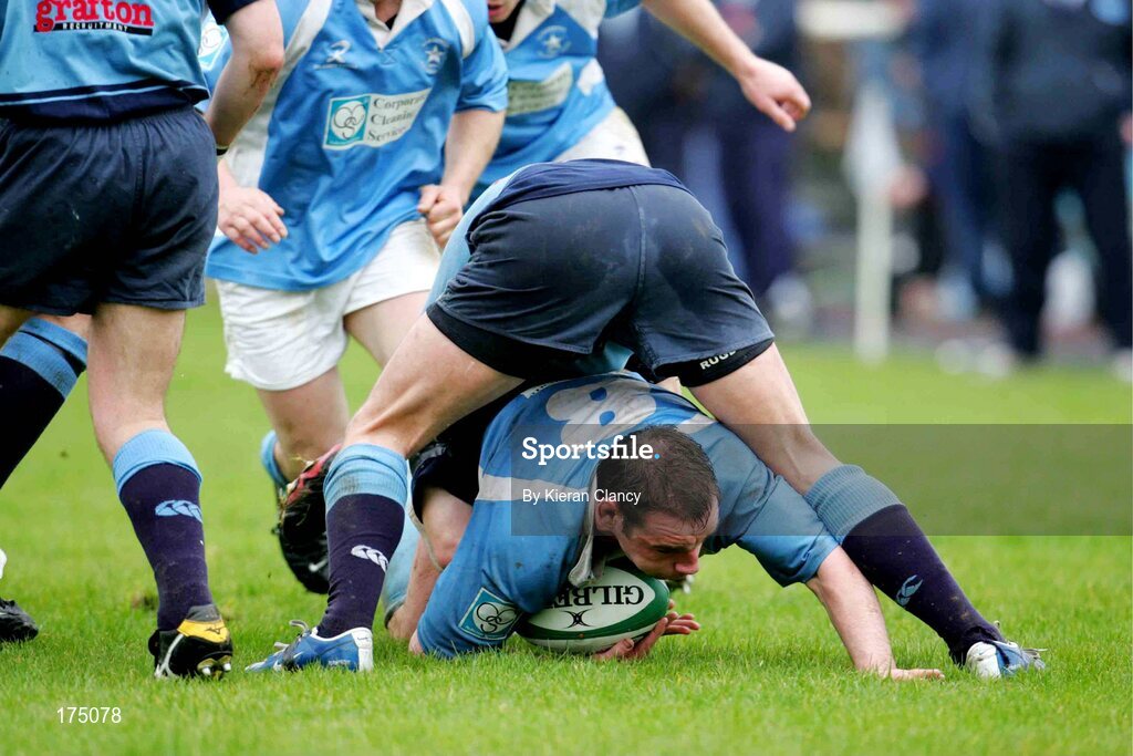 30 April 2005; Peter Malone, Garryowen, is tackled by Stuart Wilson, Belfast Harlequins. AIB All Ireland League 2004-2005, Division 1 Semi-Final, Garryowen v Belfast Harlequins, Dooradoyle, Limerick. Picture credit; Kieran Clancy / SPORTSFILE