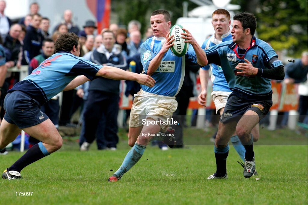 30 April 2005; Gerry Hurley, Garryowen, is tackled by Ian Humphreys, right, and Paul McKenzie, Belfast Harlequins. AIB All Ireland League 2004-2005, Division 1 Semi-Final, Garryowen v Belfast Harlequins, Dooradoyle, Limerick. Picture credit; Kieran Clancy / SPORTSFILE