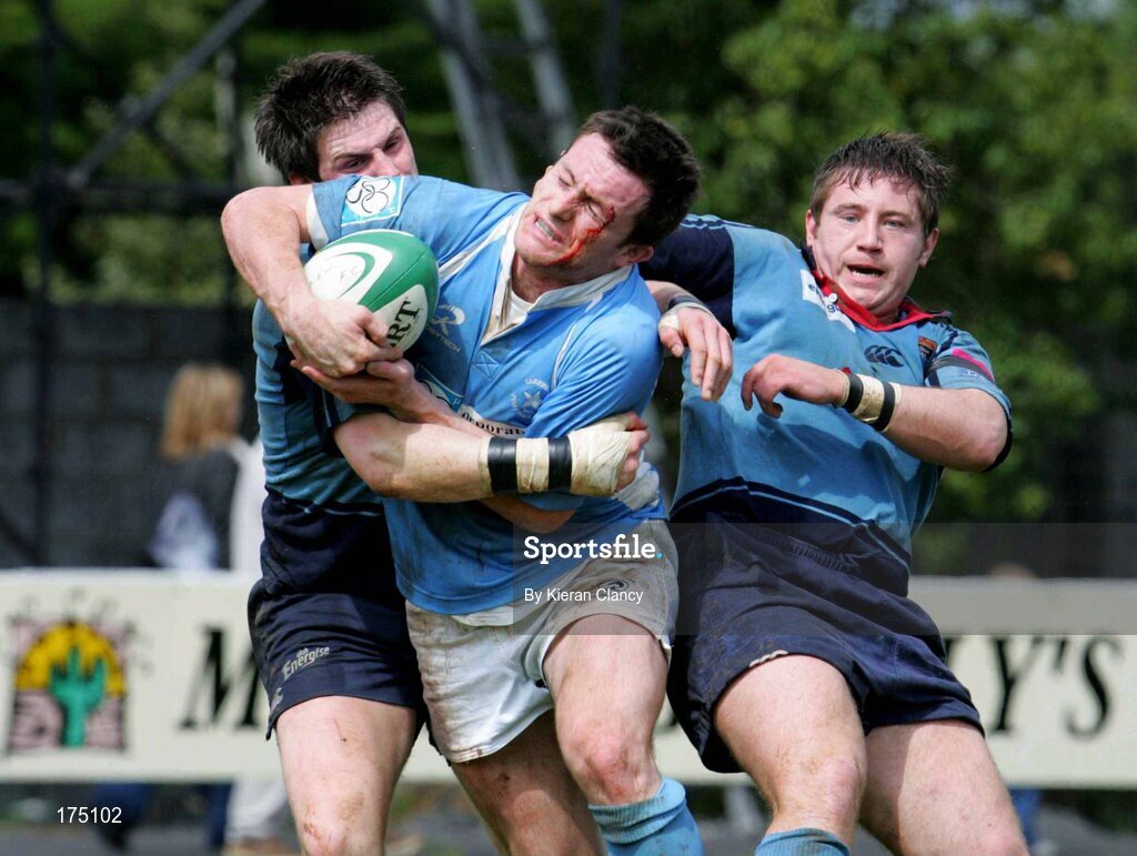 30 April 2005; Andrew Finn, Garryowen, is tackled by Greg Mitchell and Neil Hanna, Belfast Harlequins. AIB All Ireland League 2004-2005, Division 1 Semi-Final, Garryowen v Belfast Harlequins, Dooradoyle, Limerick. Picture credit; Kieran Clancy / SPORTSFILE