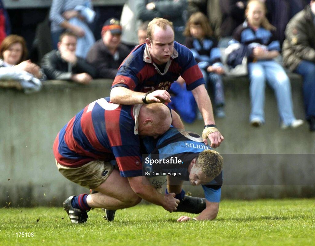 30 April 2005; Fiach O'Loughlin, Shannon, is tackled by Bernard Jackman, (2) and Dave O'Brien, Clontarf. AIB All Ireland League 2004-2005, Division 1 Semi-Final, Shannon v Clontarf, Thomond Park, Limerick. Picture credit; Damien Eagers / SPORTSFILE