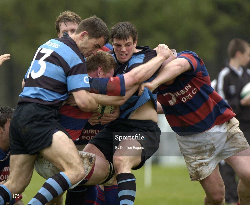 30 April 2005; Brian Touhy, (13) and Ian Dowling, Shannon, tackle Donovan Rossi and Bernard Jackman, right, Clontarf. AIB All Ireland League 2004-2005, Division 1 Semi-Final, Shannon v Clontarf, Thomond Park, Limerick. Picture credit; Damien Eagers / SPORTSFILE