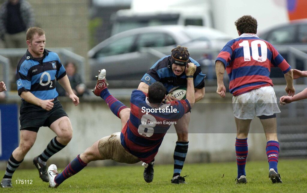 30 April 2005; Colm McMahon, Shannon, is tackled by David Tafanel, (8), Clontarf. AIB All Ireland League 2004-2005, Division 1 Semi-Final, Shannon v Clontarf, Thomond Park, Limerick. Picture credit; Damien Eagers / SPORTSFILE
