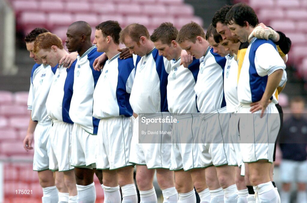 22 April 2005; Finn Harps players stand for a minute silence before the start of the game. eircom League, Premier Division, Bohemians v Finn Harps, Dalymount Park, Dublin. Picture credit; David Maher / SPORTSFILE