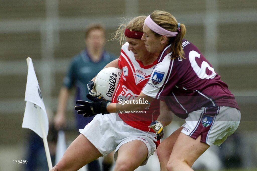 30 April 2005; Deirdre O'Reilly, Cork, is tackled by Maire O'Connell, Galway. Suzuki Ladies National Football League, Division 1 Final, Cork v Galway, Gaelic Grounds, Limerick. Picture credit; Ray McManus / SPORTSFILE
