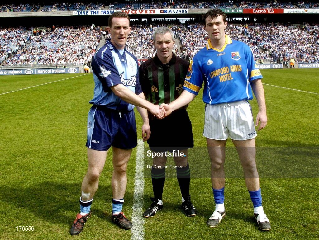 15 May 2005; Dublin captain Paddy Christie shakes hands with Longford captain Paul Barden in the presence of Referee Paddy Russell. Bank Of Ireland Leinster Senior Football Championship, Dublin v Longford, Croke Park, Dublin. Picture credit; Damien Eagers / SPORTSFILE