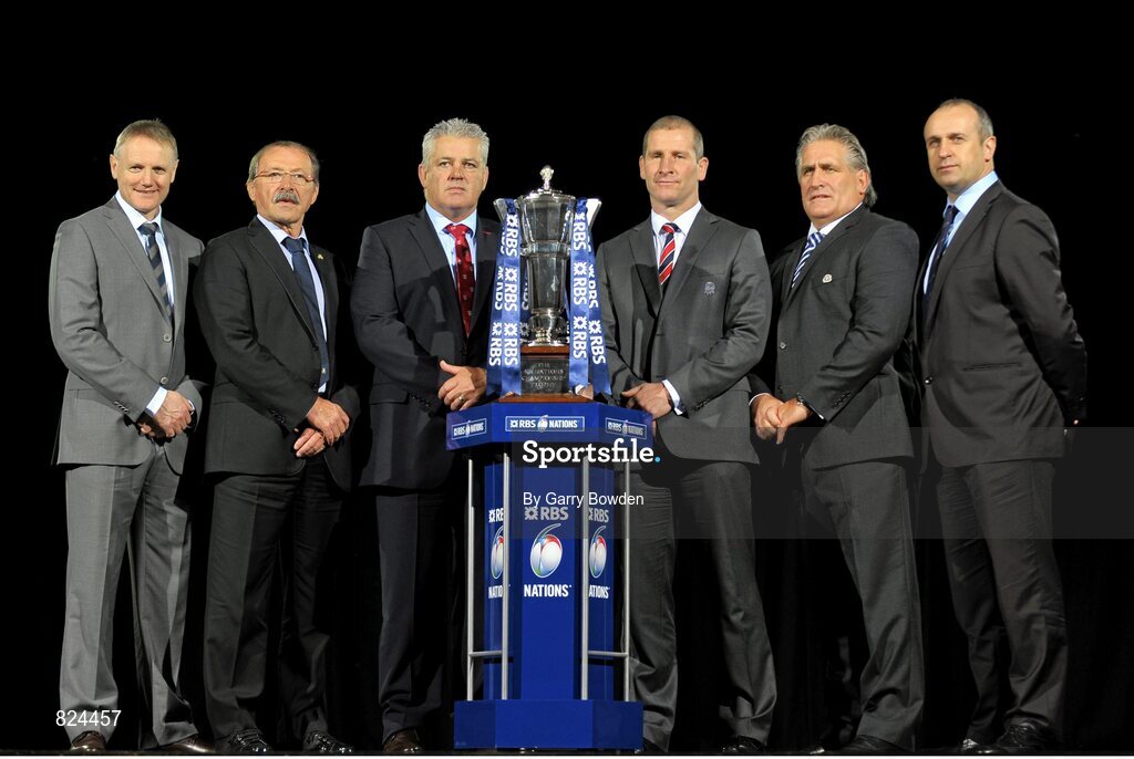 22 January 2014; In attendance at the launch of the 2014 RBS Six Nations Championship are head coaches, from left to right, Ireland's Joe Schmidt, Italy's Jacques Brunel, Wales' Warren Gatland, England's Stuart Lancaster, Scotland's Vern Cotter and France's Phillipe Saint-Andre with the RBS Six Nations Championship trophy. RBS Six Nations Championship 2014 Launch, The Hurlingham Club, Ranelagh Gardens, London. Picture credit: Garry Bowden / SPORTSFILE