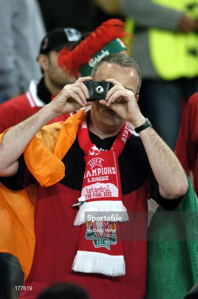 25 May 2005; A Liverpool supporter takes a picture during the game. UEFA Champions League Final, Liverpool v AC Milan, Ataturk Olympic Stadium, Istanbul, Turkey. Picture credit; David Maher / SPORTSFILE