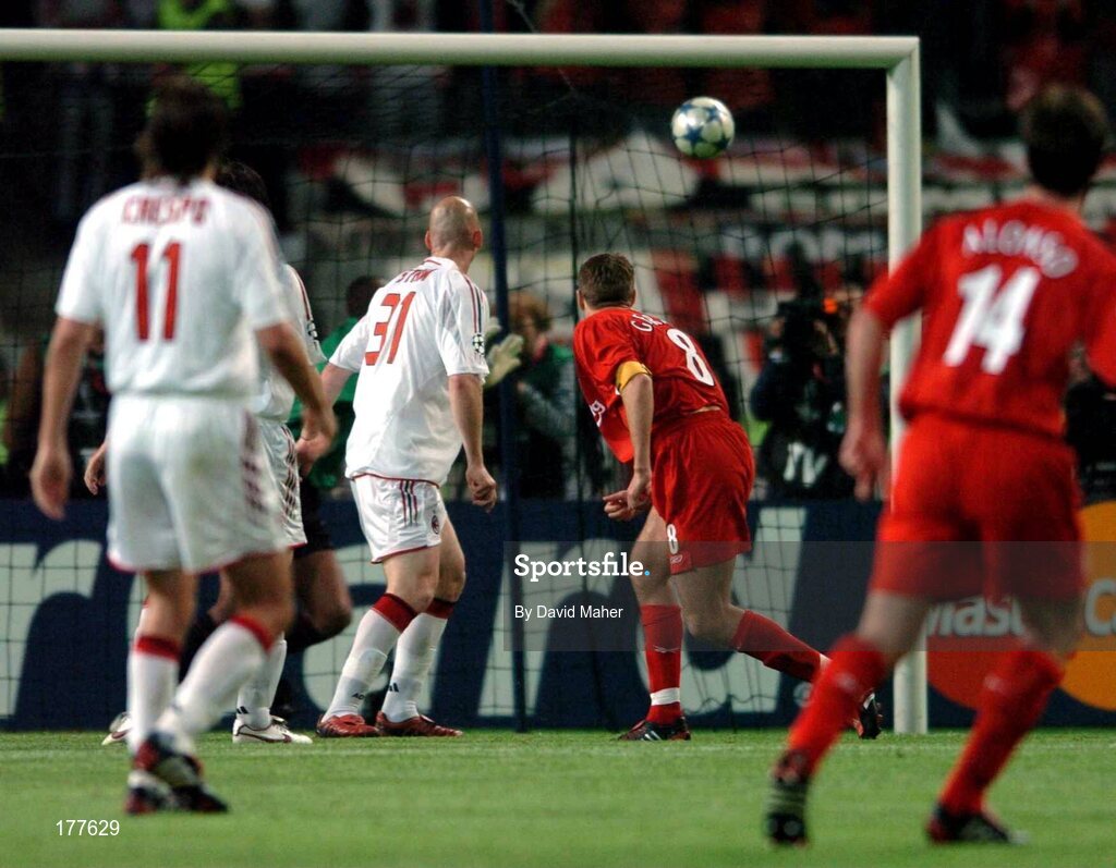 25 May 2005; Steven Gerrard, Liverpool, beats Jaap Stam, AC Milan, to score his sides first goal. UEFA Champions League Final, Liverpool v AC Milan, Atatürk Olympic Stadium, Istanbul, Turkey. Picture credit; David Maher / SPORTSFILE
