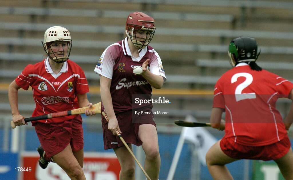 29 May 2005; Brendan Kerins, Galway, in action against Joanne O'Callaghan, left, and Jennifer Browne, Cork. National Camogie League, Division 1 Final, Galway v Cork, Semple Stadium, Thurles, Co. Tipperary. Picture credit; Brendan Moran / SPORTSFILE