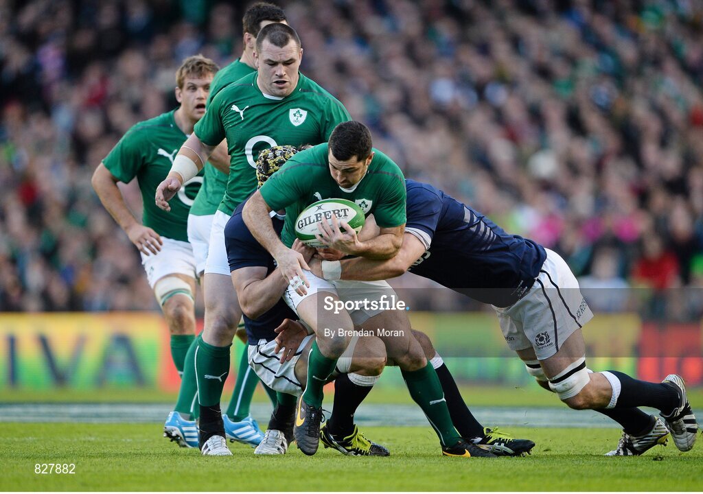 2 February 2014; Rob Kearney, Ireland, is tackled by Kelly Brown, and Tim Swinson, Scotland, right. RBS Six Nations Rugby Championship, Ireland v Scotland, Aviva Stadium, Lansdowne Road, Dublin. Picture credit: Brendan Moran / SPORTSFILE