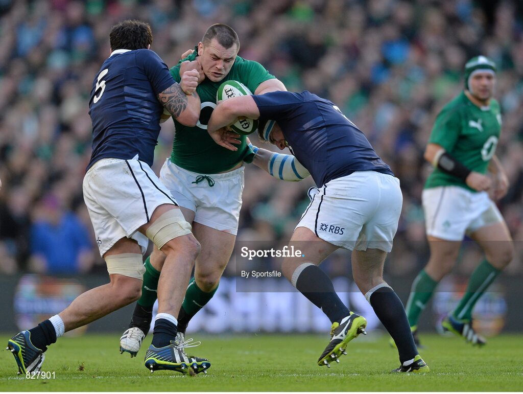 2 February 2014; Cian Healy, Ireland, is tackled by Jim Hamilton, left, and Moray Low, Scotland. RBS Six Nations Rugby Championship, Ireland v Scotland, Aviva Stadium, Lansdowne Road, Dublin. Photo by Sportsfile