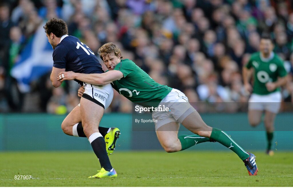 2 February 2014; Alex Dunbar, Scotland, is tackled by Andrew Trimble, Ireland. RBS Six Nations Rugby Championship, Ireland v Scotland, Aviva Stadium, Lansdowne Road, Dublin. Photo by Sportsfile