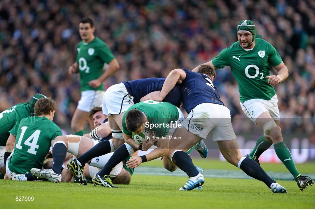 2 February 2014; Ireland's Conor Murray gets in between Scotland's Kelly Brown, left, and Ross Ford. RBS Six Nations Rugby Championship, Ireland v Scotland, Aviva Stadium, Lansdowne Road, Dublin. Picture credit: Brendan Moran / SPORTSFILE