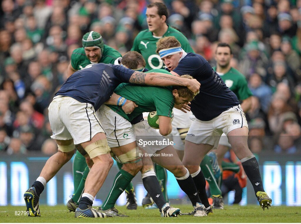 2 February 2014; Chris Henry, Ireland, is tackled by Jim Hamilton, left, and Ryan Grant, Scotland. RBS Six Nations Rugby Championship, Ireland v Scotland, Aviva Stadium, Lansdowne Road, Dublin. Picture credit: Brendan Moran / SPORTSFILE