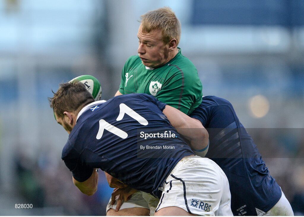 2 February 2014; Luke Marshall, Ireland, loses possession as he is tackled by Sean Lamont, 11, and Alex Dunbar, Scotland. RBS Six Nations Rugby Championship, Ireland v Scotland, Aviva Stadium, Lansdowne Road, Dublin. Picture credit: Brendan Moran / SPORTSFILE
