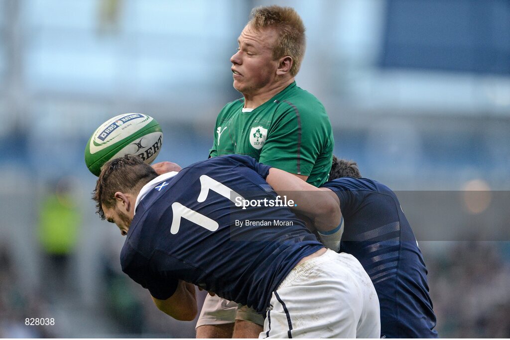 2 February 2014; Luke Marshall, Ireland, loses possession as he is tackled by Sean Lamont, 11, and Alex Dunbar, Scotland. RBS Six Nations Rugby Championship, Ireland v Scotland, Aviva Stadium, Lansdowne Road, Dublin. Picture credit: Brendan Moran / SPORTSFILE