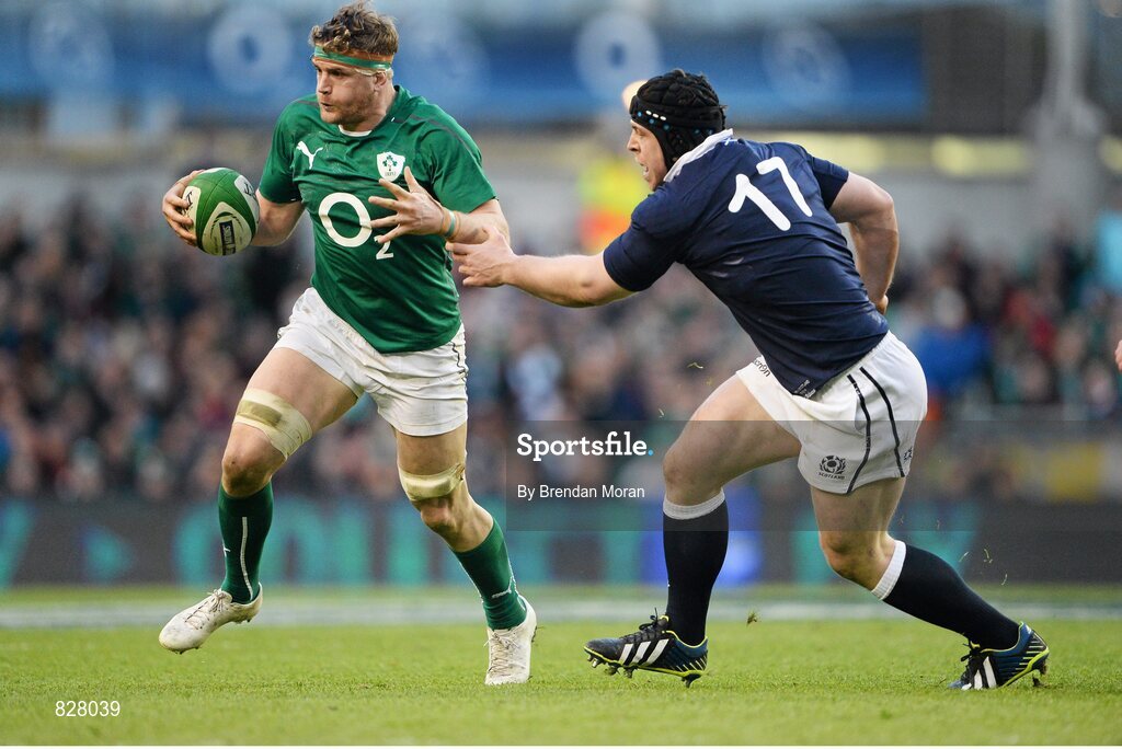 2 February 2014; Jamie Healsip, Ireland, gets away from Alasdair Dickinson, Scotland. RBS Six Nations Rugby Championship, Ireland v Scotland, Aviva Stadium, Lansdowne Road, Dublin. Picture credit: Brendan Moran / SPORTSFILE