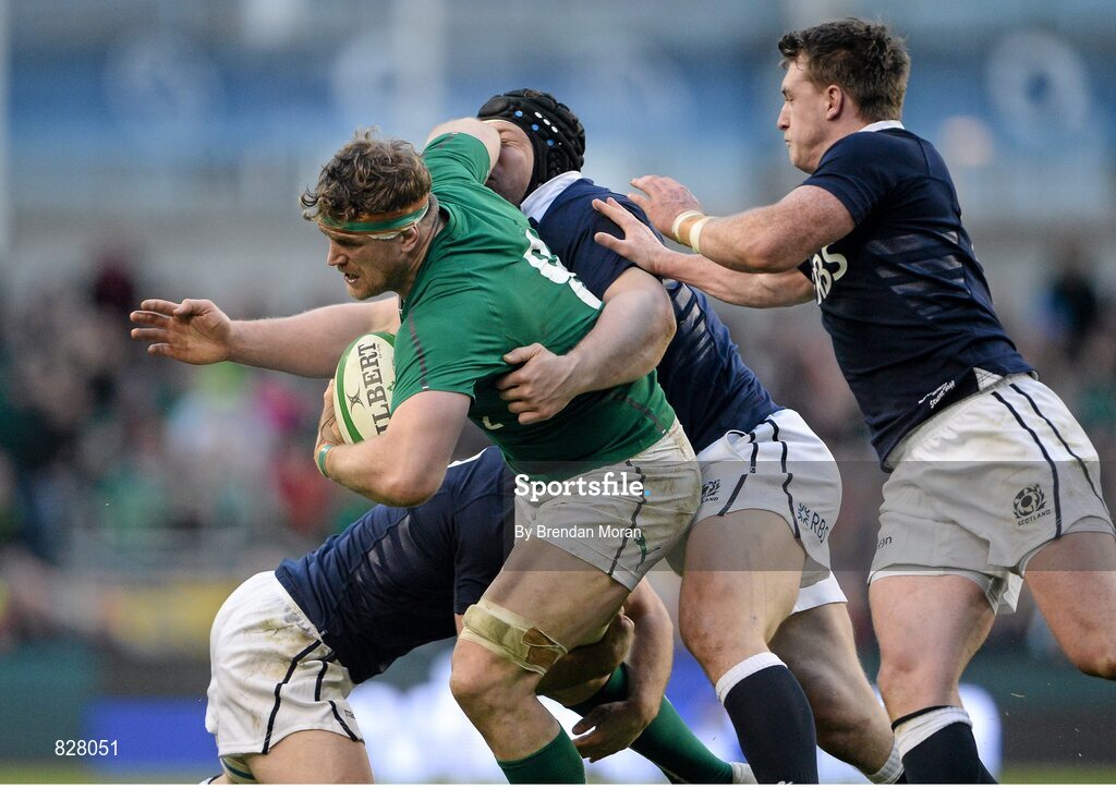 2 February 2014; Jamie Heaslip, Ireland, is tackled by Scotland players, from left, Greig Laidlaw, Alasdair Dickinson and Stuart Hogg. RBS Six Nations Rugby Championship, Ireland v Scotland, Aviva Stadium, Lansdowne Road, Dublin. Picture credit: Brendan Moran / SPORTSFILE