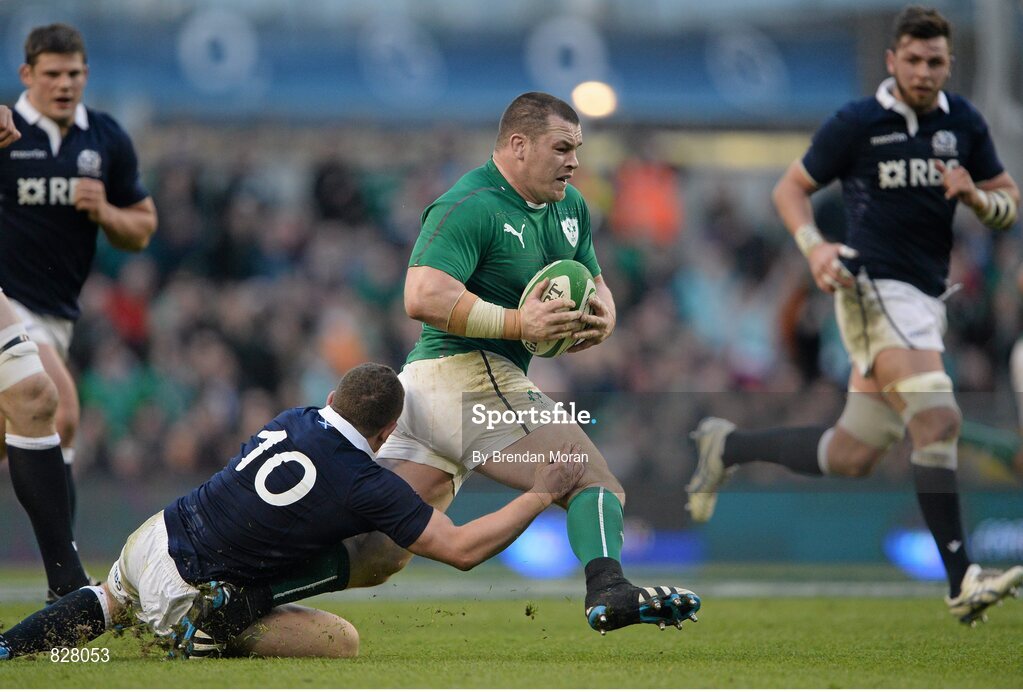 2 February 2014; Cian Healy, Ireland, is tackled by Duncan Weir, Scotland. RBS Six Nations Rugby Championship, Ireland v Scotland, Aviva Stadium, Lansdowne Road, Dublin. Picture credit: Brendan Moran / SPORTSFILE