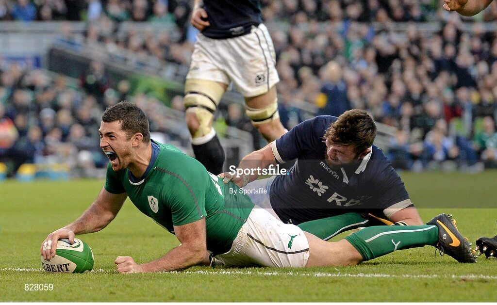2 February 2014; Rob Kearney, Ireland, goes over to score his side's third try despite the efforts of Ryan Wilson, Scotland. RBS Six Nations Rugby Championship, Ireland v Scotland, Aviva Stadium, Lansdowne Road, Dublin. Photo by Sportsfile
