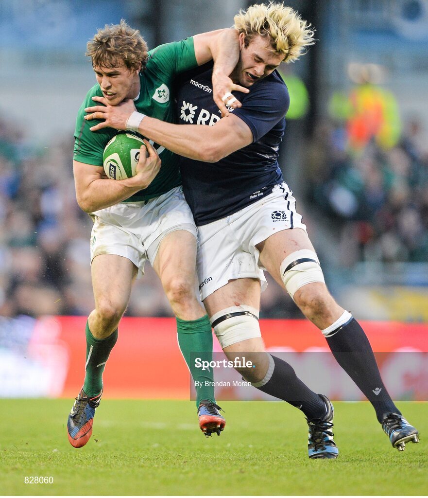 2 February 2014; Ireland's Andrew Trimble is tackled by Scotland's Richie Gray. RBS Six Nations Rugby Championship, Ireland v Scotland, Aviva Stadium, Lansdowne Road, Dublin. Picture credit: Brendan Moran / SPORTSFILE