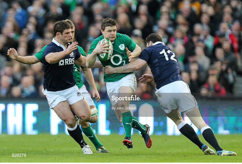 2 February 2014; Brian O'Driscoll, Ireland, is tackled by Duncan Taylor, Scotland. RBS Six Nations Rugby Championship, Ireland v Scotland, Aviva Stadium, Lansdowne Road, Dublin. Picture credit: John Dickson / SPORTSFILE