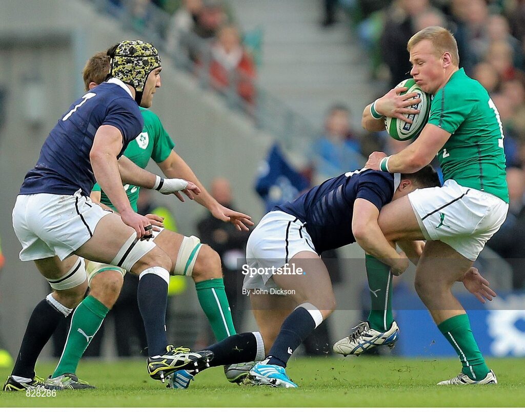 2 February 2014; Luke Marshall, Ireland, is tackled by Duncan Weir, Scotland. RBS Six Nations Rugby Championship, Ireland v Scotland, Aviva Stadium, Lansdowne Road, Dublin. Picture credit: John Dickson / SPORTSFILE