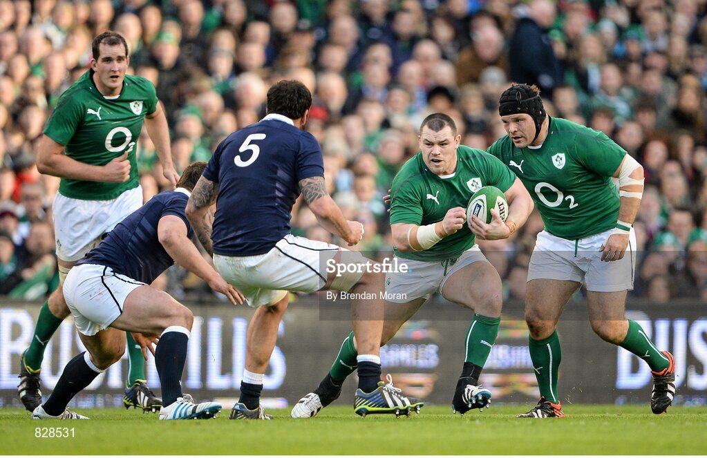 2 February 2014; Cian Healy, Ireland, supported by team-mates Devin Toner, left, and Mike Ross, in action against Scotland. RBS Six Nations Rugby Championship, Ireland v Scotland, Aviva Stadium, Lansdowne Road, Dublin. Picture credit: Brendan Moran / SPORTSFILE
