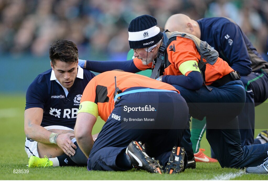 2 February 2014; Sean Maitland, Scotland, is attended to by Scottish medical staff before leaving the pitch with an injury. RBS Six Nations Rugby Championship, Ireland v Scotland, Aviva Stadium, Lansdowne Road, Dublin. Picture credit: Brendan Moran / SPORTSFILE