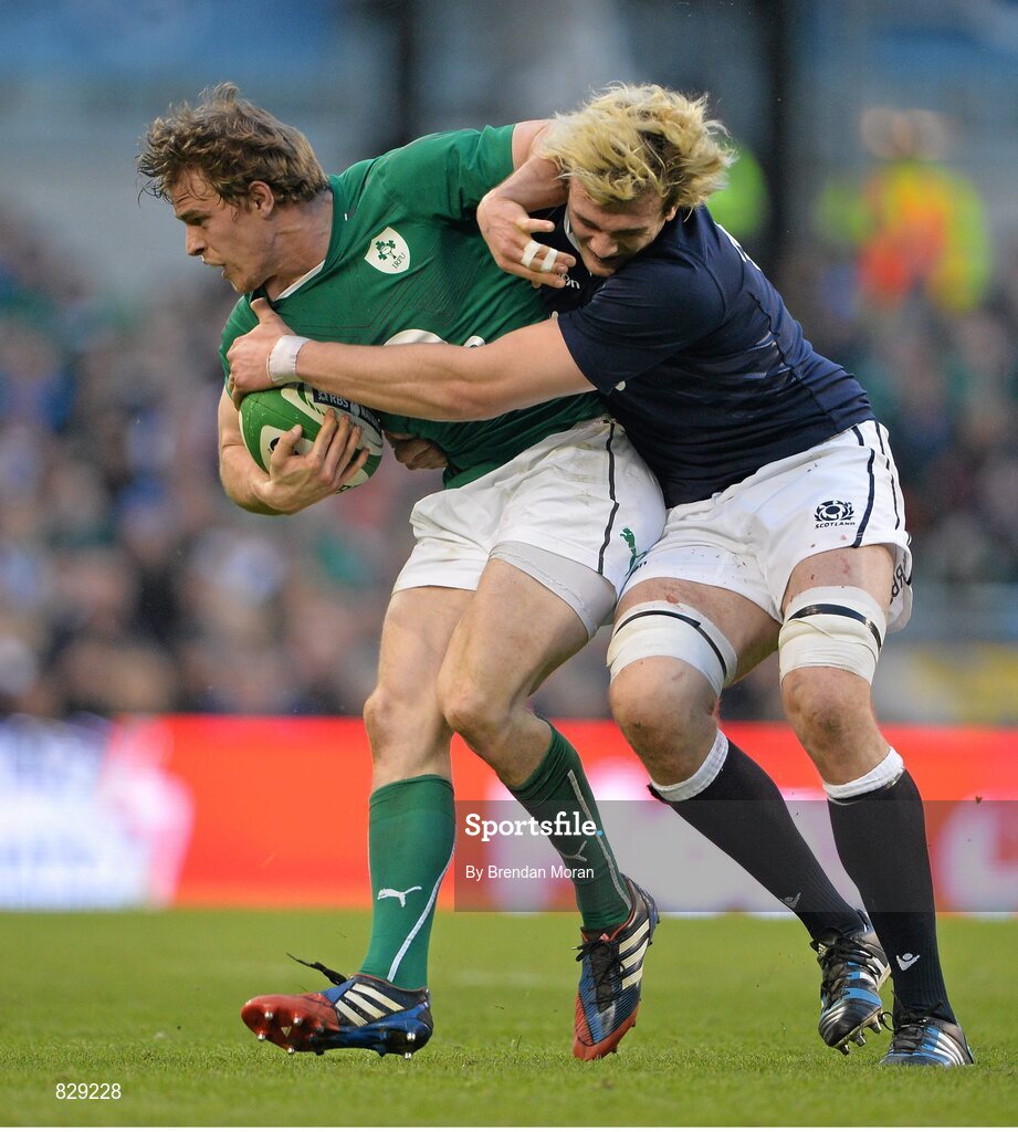 2 February 2014; Andrew Trimble, Ireland, is tackled by Richie Gray, Scotland. RBS Six Nations Rugby Championship, Ireland v Scotland, Aviva Stadium, Lansdowne Road, Dublin. Picture credit: Brendan Moran / SPORTSFILE