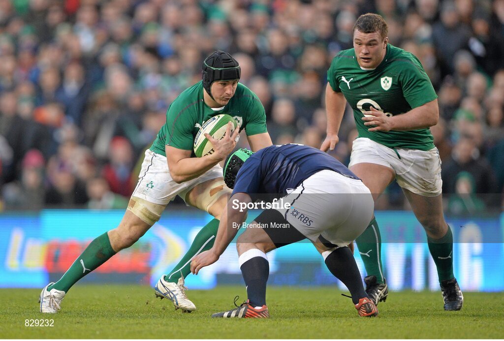 2 February 2014; Tommy O'Donnell, Ireland, is tackled by Geoff Cross, Scotland. RBS Six Nations Rugby Championship, Ireland v Scotland, Aviva Stadium, Lansdowne Road, Dublin. Picture credit: Brendan Moran / SPORTSFILE