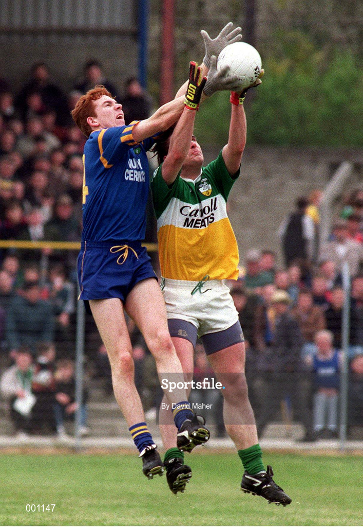 22 May 1997; Ken Kelleghan of Offaly in action against Darren Coffey of Wicklow during the Bank of Ireland Leinster Senior Football Championship Quarter-Final match between Wicklow and Offaly at Croke Park in Dublin. Photo by David Maher/Sportsfile