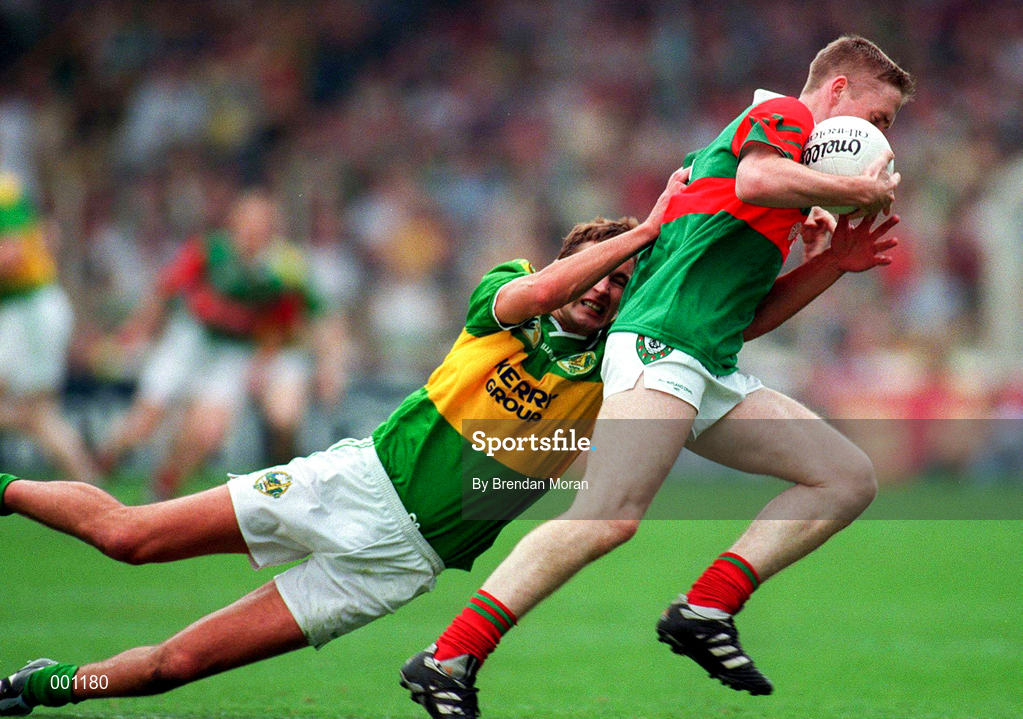 28 September 1997; David Heaney of Mayo is tackled by Maurice Fitzgerald of Kerry during the GAA Football All-Ireland Senior Championship Final match between Kerry and Mayo at Croke Park in Dublin. Photo by Brendan Moran/Sportsfile