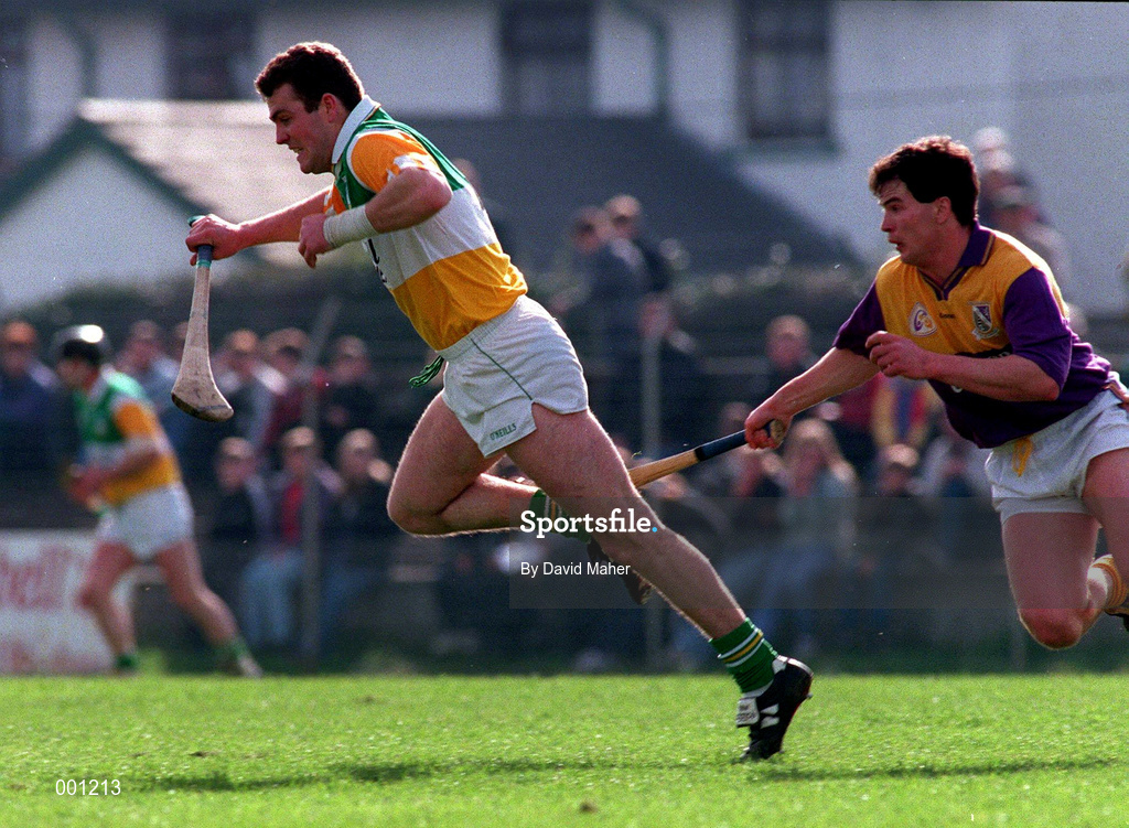 23 March 1997; Kevin Martin of Offaly in action against Adrian Fenlon of Wexford during the National Hurling League Division 1 match between Offaly and Wexford at St. Brendan's Park in Birr, Offaly. Photo by David Maher/Sportsfile