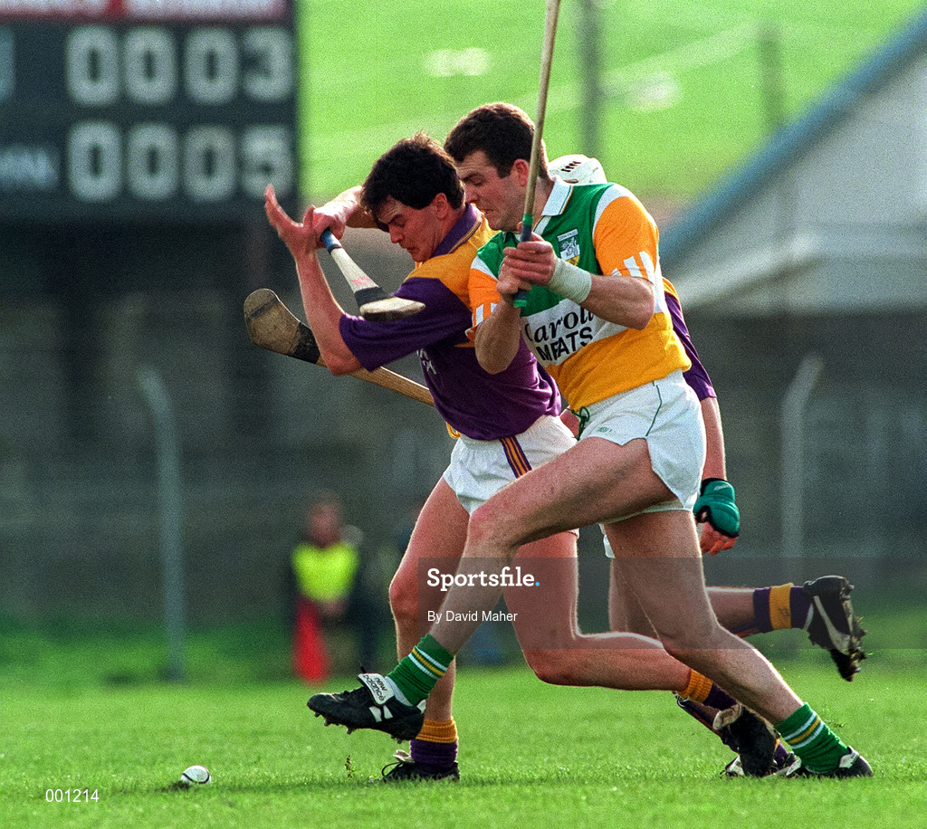 23 March 1997; Kevin Martin of Offaly in action against Adrian Fenlon of Wexford during the National Hurling League Division 1 match between Offaly and Wexford at St. Brendan's Park in Birr, Offaly. Photo by David Maher/Sportsfile