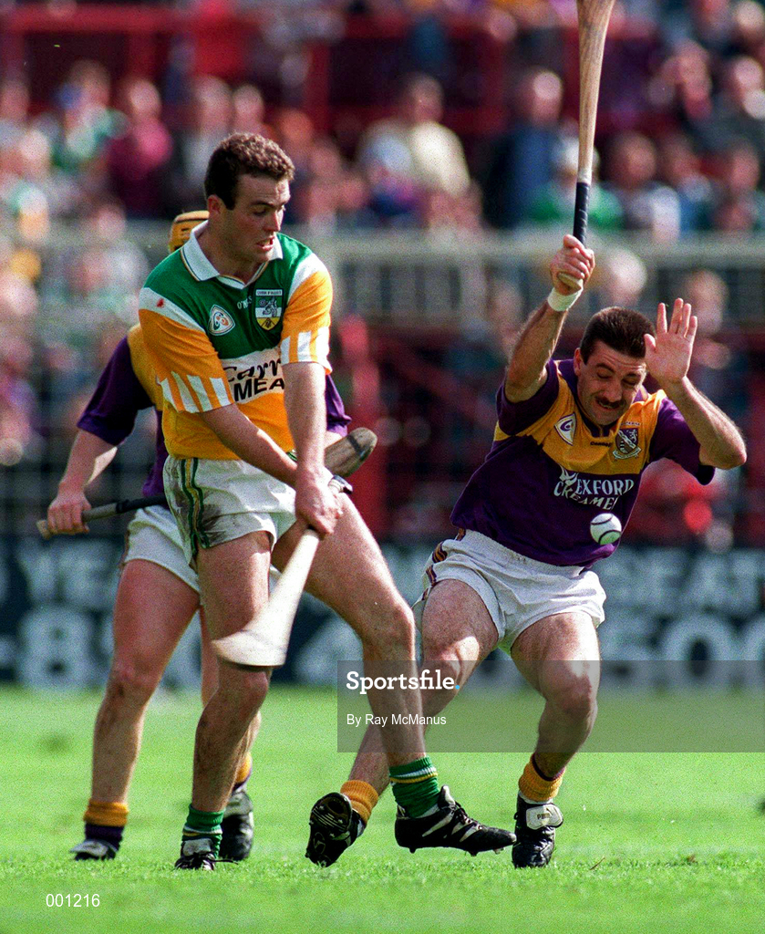 22 June 1997; Kevin Martin of Offaly in action against Martin Storey of Wexford during the GAA Leinster Senior Hurling Championship Semi-Final match between Wexford and Offaly at Croke Park in Dublin. Photo by Ray McManus/Sportsfile