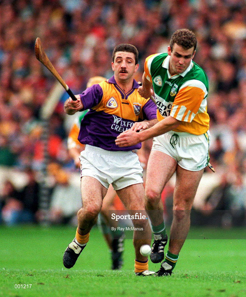 22 June 1997; Kevin Martin of Offaly in action against Martin Storey of Wexford during the GAA Leinster Senior Hurling Championship Semi-Final match between Wexford and Offaly at Croke Park in Dublin. Photo by Ray McManus/Sportsfile