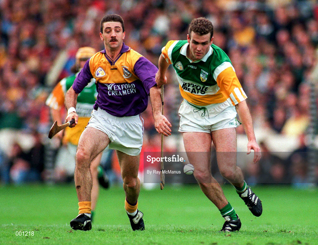 22 June 1997; Kevin Martin of Offaly in action against Martin Storey of Wexford during the GAA Leinster Senior Hurling Championship Semi-Final match between Wexford and Offaly at Croke Park in Dublin. Photo by Ray McManus/Sportsfile