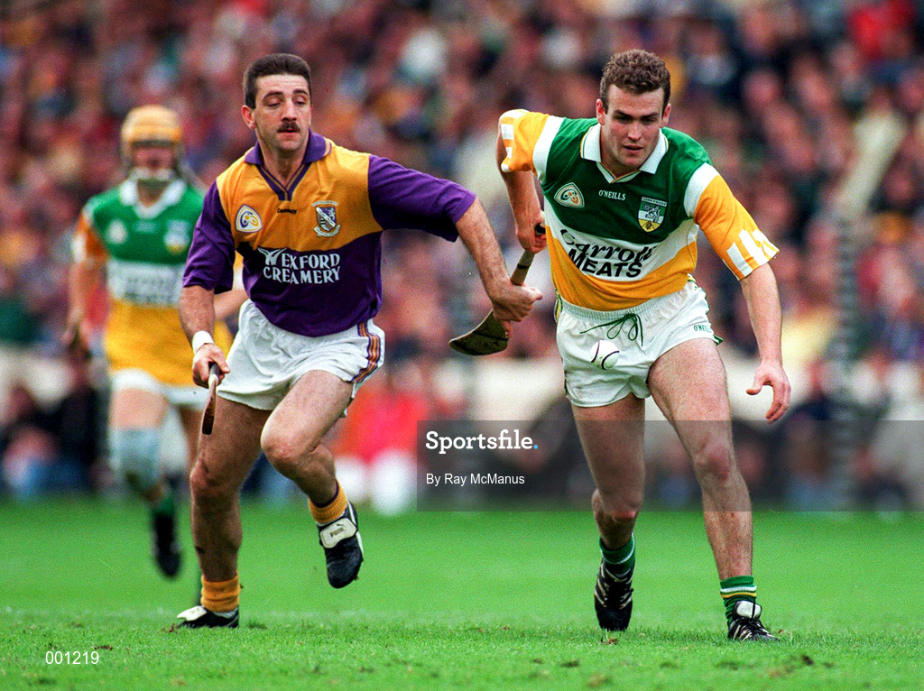 22 June 1997; Kevin Martin of Offaly in action against Martin Storey of Wexford during the GAA Leinster Senior Hurling Championship Semi-Final match between Wexford and Offaly at Croke Park in Dublin. Photo by Ray McManus/Sportsfile