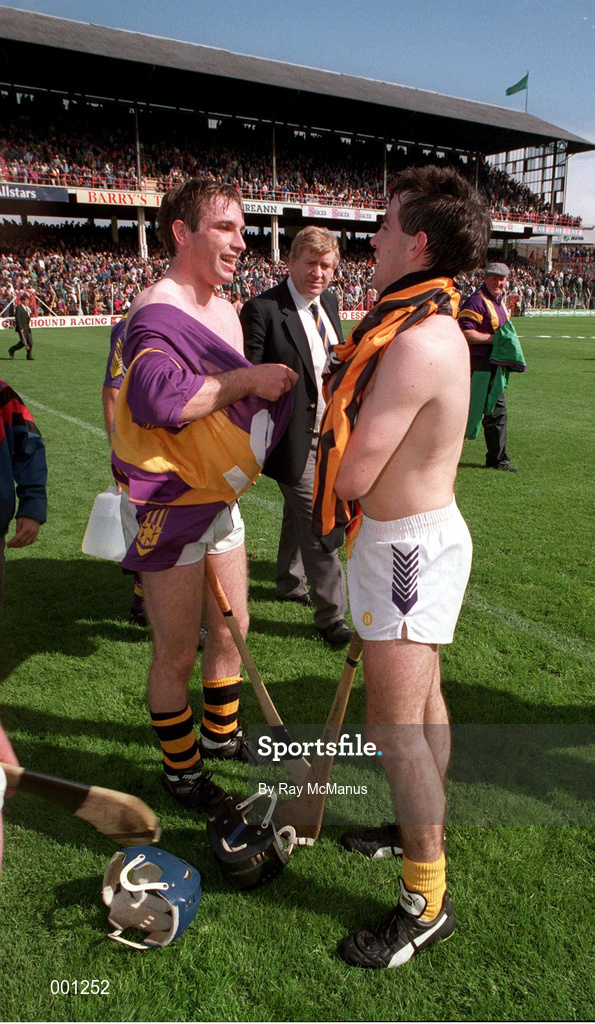 11 July 1993; Liam Dunne of Wexford, right, and DJ Carey of Kilkenny swap jerseys following the Leinster Senior Hurling Championship Final match between Kilkenny and Wexford at Croke Park in Dublin. Photo by Ray McManus/Sportsfile