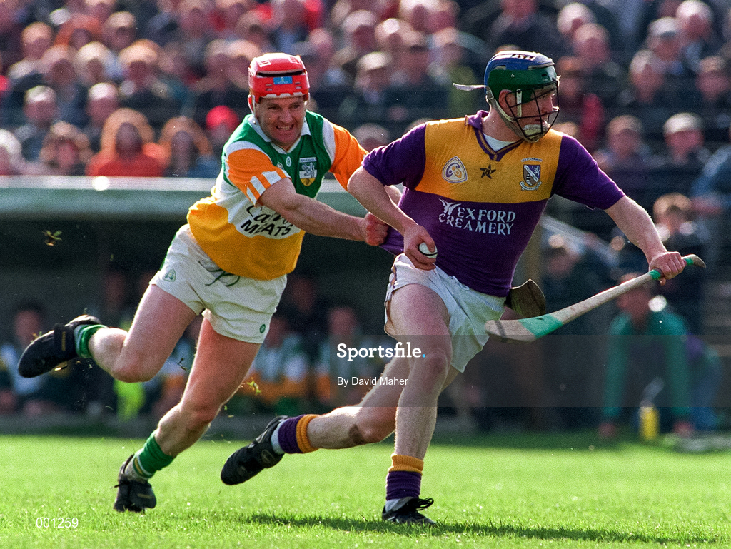 23 March 1997; Larry Murphy of Wexford in action against Martin Hanamy of Offaly during the National Hurling League Division 1 match between Offaly and Wexford at St. Brendan's Park in Birr, Offaly. Photo by David Maher/Sportsfile