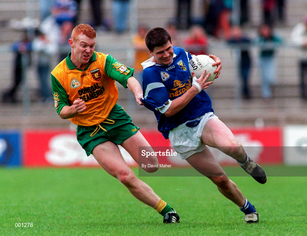 22 June 1997; Larry Reilly of Cavan in action against Peter McGinley of Donegal during the Ulster GAA Football Senior Championship Semi-Final match between Cavan and Donegal at St. Tiernach's Park in Clones, Monaghan. Photo by David Maher/Sportsfile