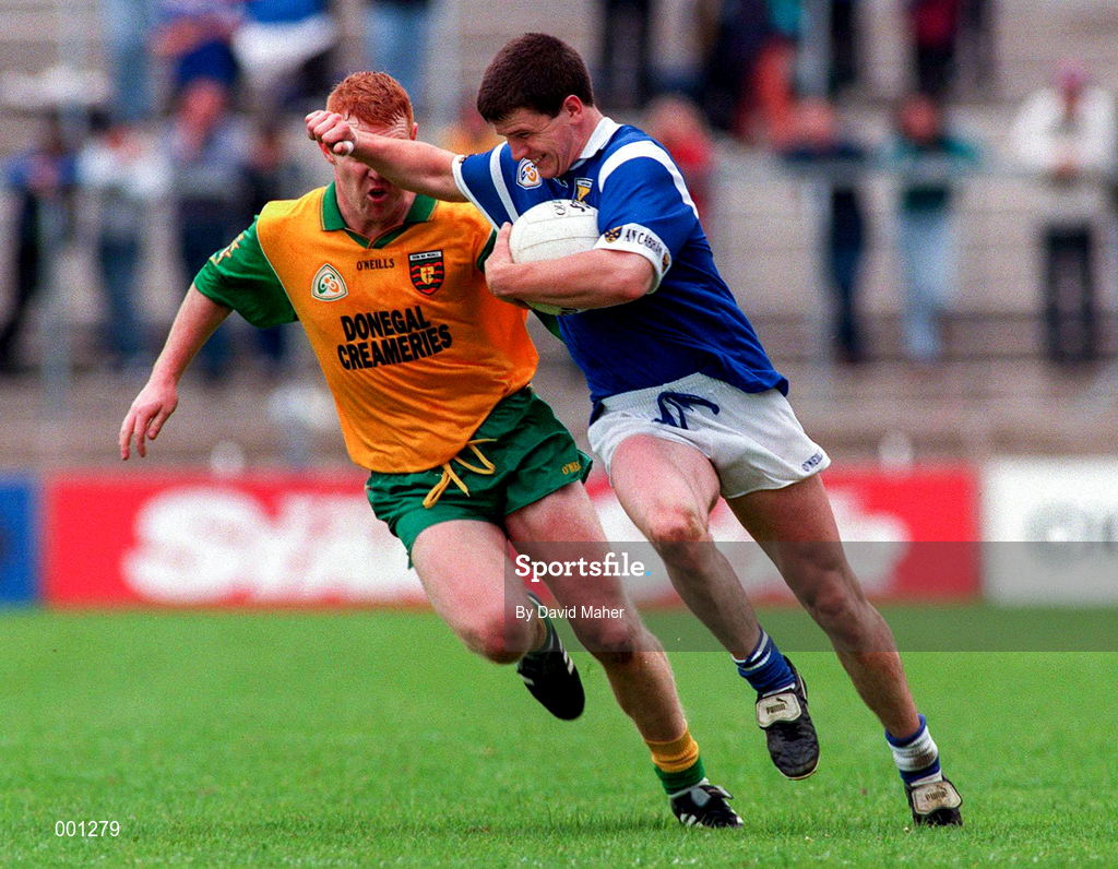 22 June 1997; Larry Reilly of Cavan in action against Peter McGinley of Donegal during the Ulster GAA Football Senior Championship Semi-Final match between Cavan and Donegal at St. Tiernach's Park in Clones, Monaghan. Photo by David Maher/Sportsfile