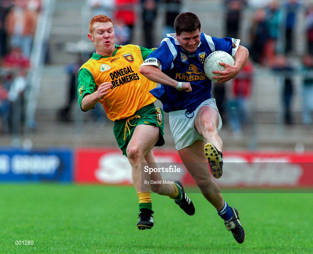 22 June 1997; Larry Reilly of Cavan in action against Peter McGinley of Donegal during the Ulster GAA Football Senior Championship Semi-Final match between Cavan and Donegal at St. Tiernach's Park in Clones, Monaghan. Photo by David Maher/Sportsfile